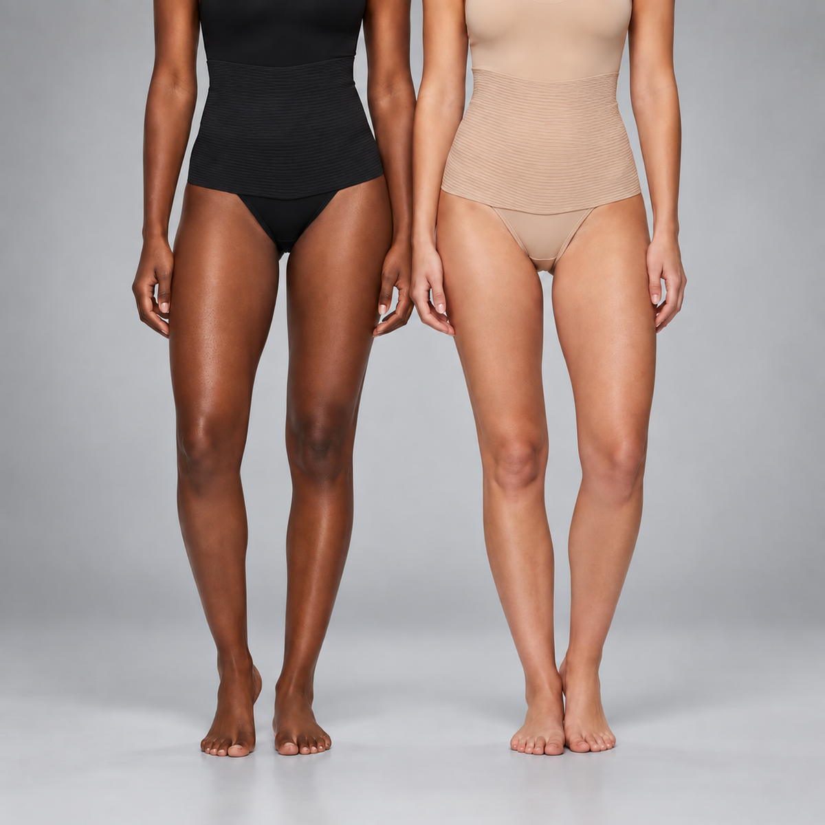 Duas modelos vestindo as calcinhas com cinta Aconchego preta e bege, de corpo inteiro